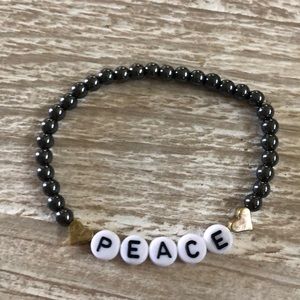 Gun  metal grey beaded peace bracelet
